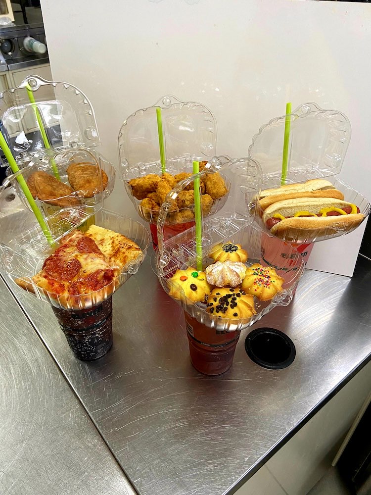 Array of GoLidZ cups with various food items